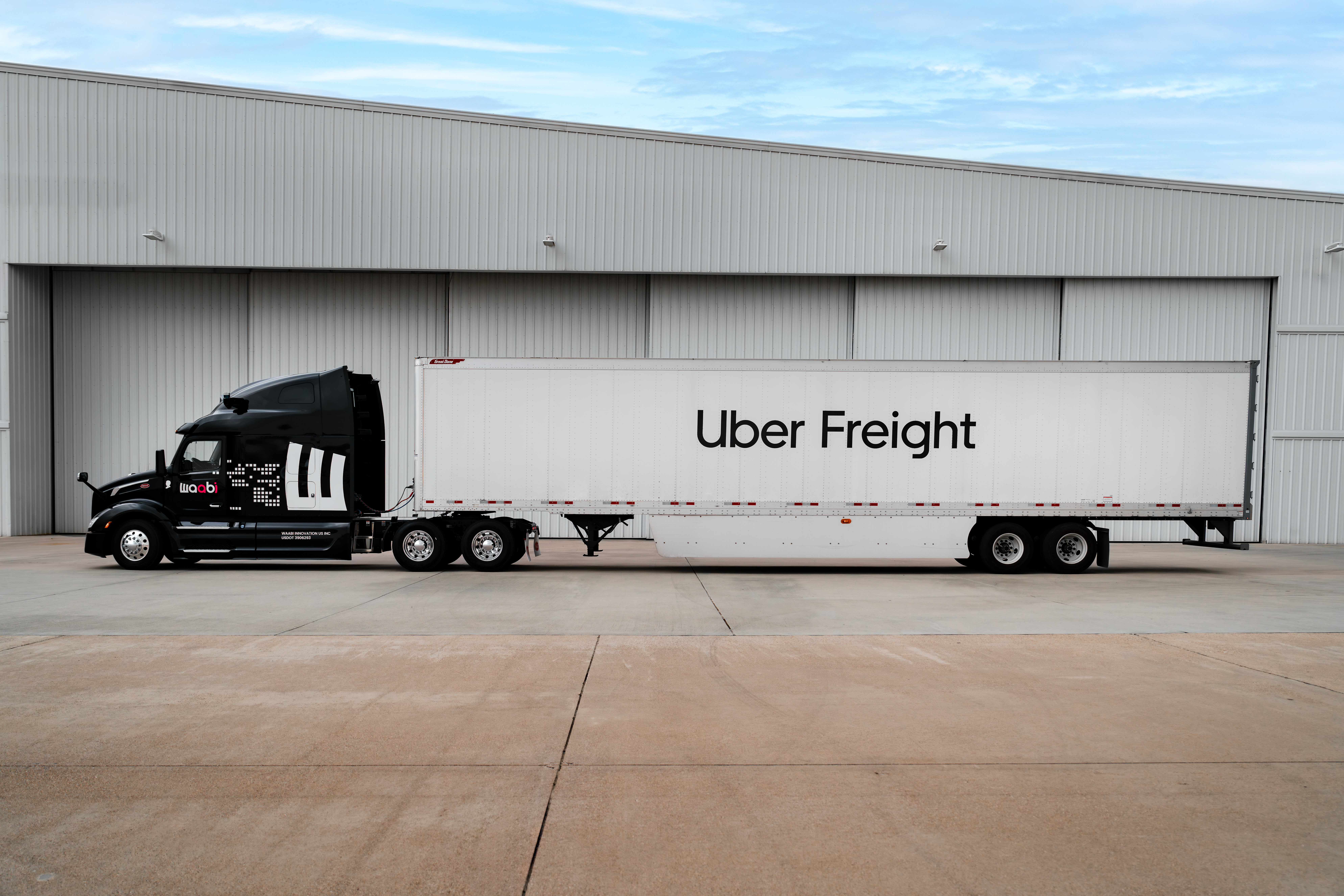 A Waabi self driving truck pulling an Uber Freight trailer. Photo by Debora Conn